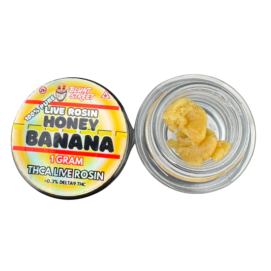 Jar of live rosin labeled 'Honey Banana' with a visible brand on a white background