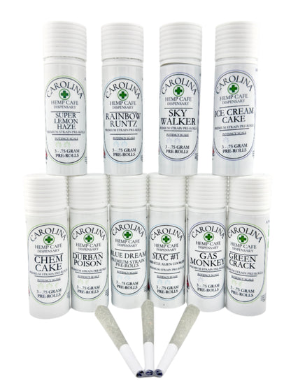 Display of 10 White cylinder Jars by Carolina Hemp Cafe with 3 pre-rolls laying in front of it them