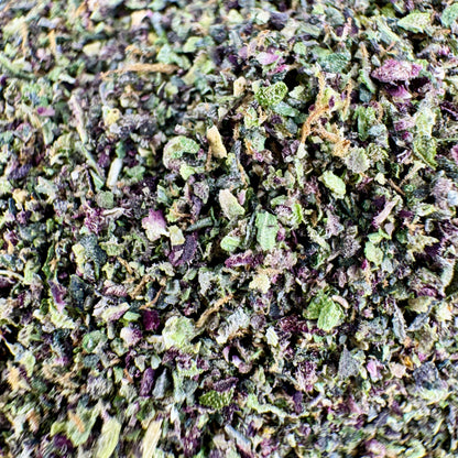 Close-up of dried green and purple herbs