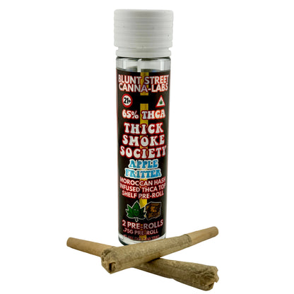 Blunt Street Canna-Labs vape pen with two pre-rolled joints on a white background