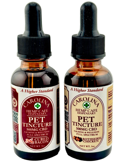 Two bottles of Carolina Hemp Cafe Pet Tincture with dropper caps on a light gray background.