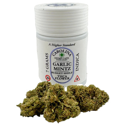 Jar of Carolina Hemp Cafe Garlic Mintz IndicaTHCA flower on a white background
