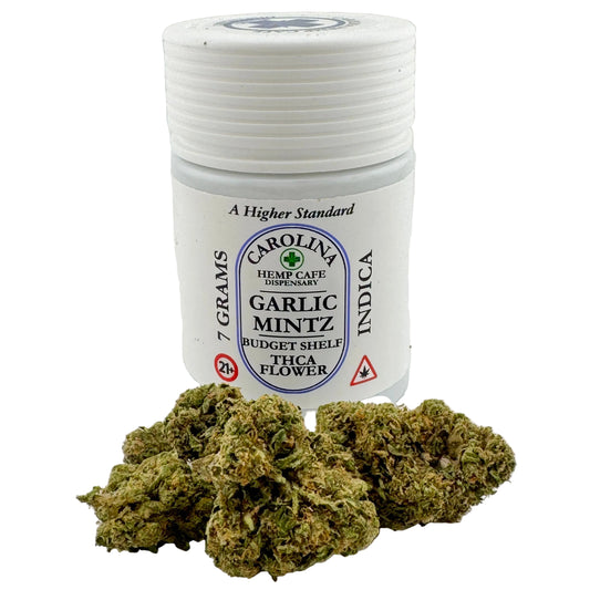 Jar of Carolina Hemp Cafe Garlic Mintz IndicaTHCA flower on a white background