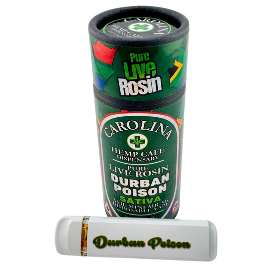 Green container labeled 'Carolina' with a white device labeled 'Durban Poison' on a light gray background