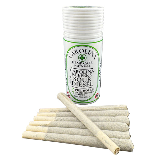 Tube of Carolina Hemp Cafe pre-rolled joints on a dark surface