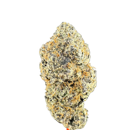 Close-up of a clump of cannabis on a gray background