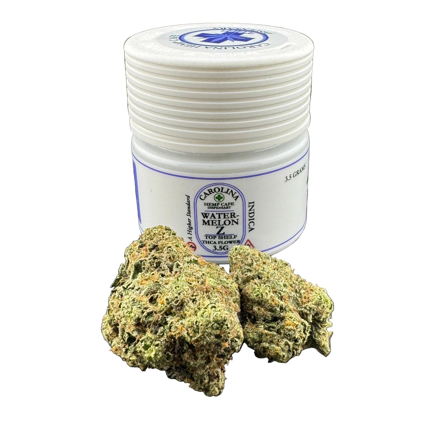 White container with blue label and cannabis buds on a dark surface
