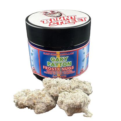 Jar of 'Gary Payton Frosty Nugs' with two nugs on a dark surface