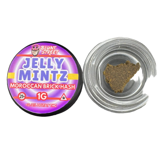 Jelly Mintz Moroccan Brick Hash container with hash inside on a gray background