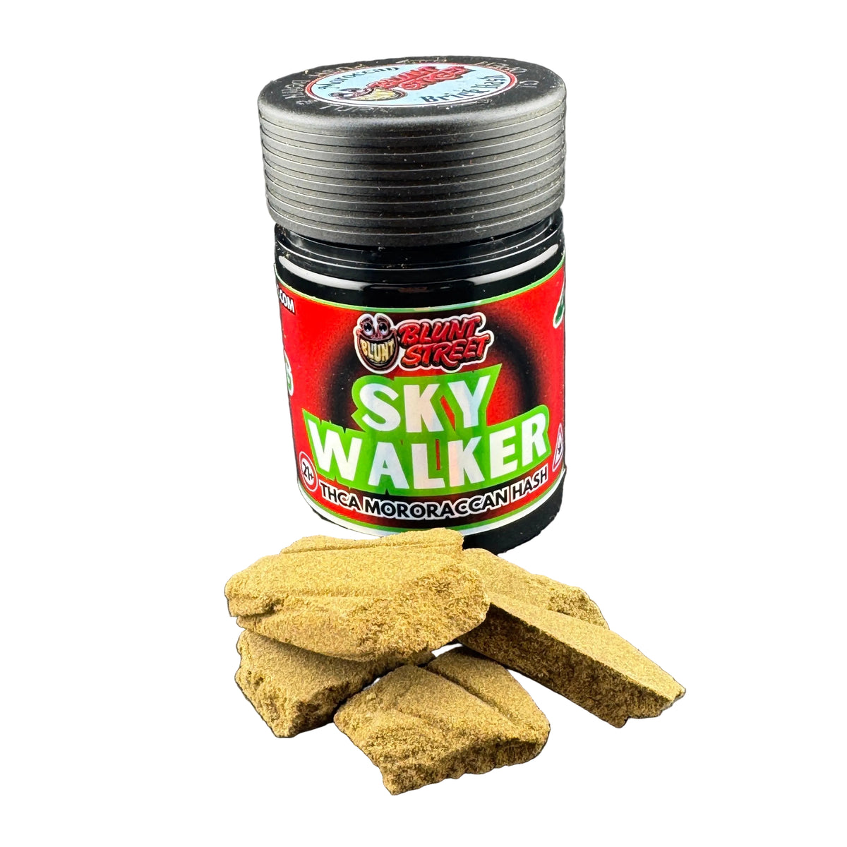 A jar of Skunk Street Sky Walker Angler's Choice Carp and Rock bait mix, shown with several pieces of the brown bait scattered in front on a dark gray background.