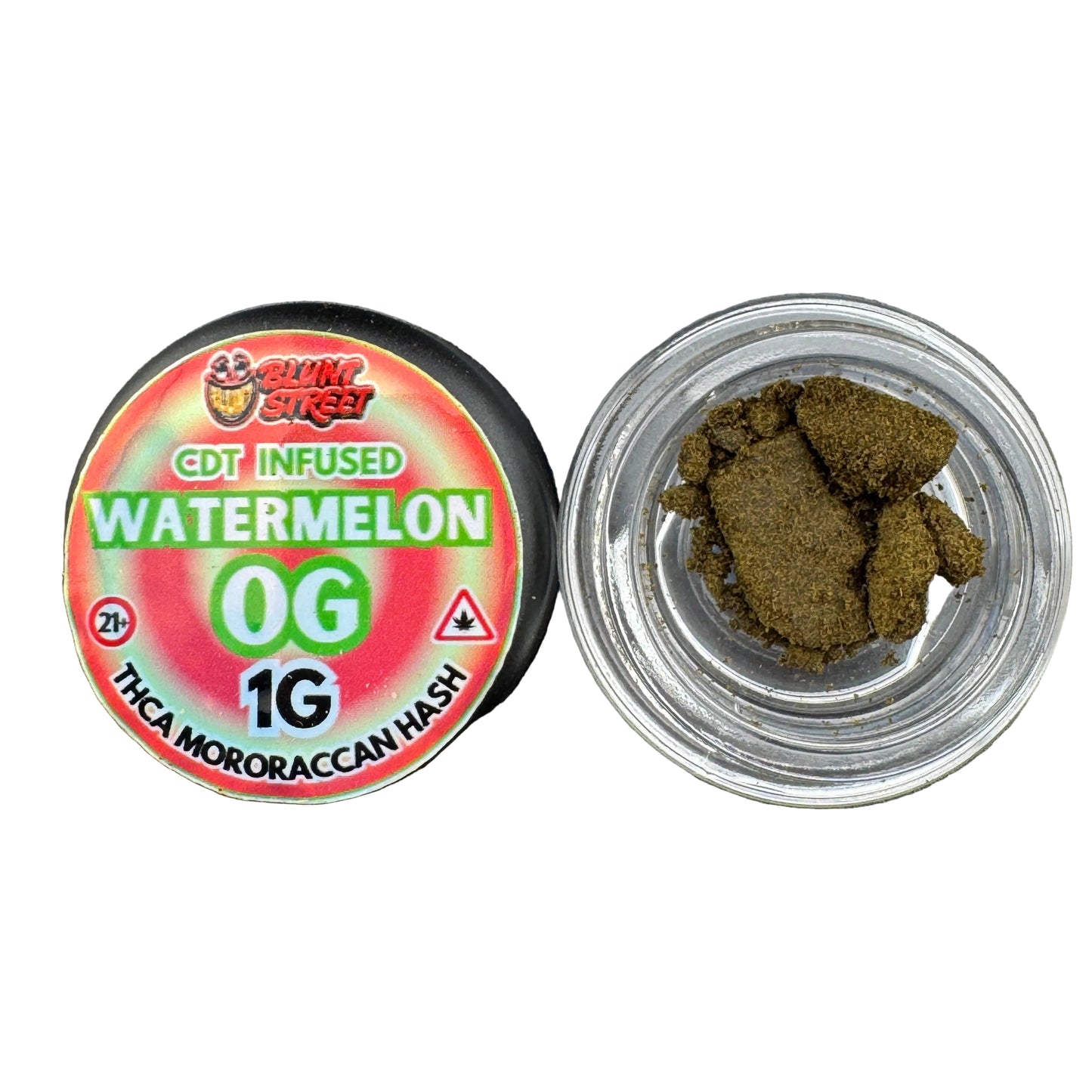 A small round jar of GDT Infused Watermelon OG THCA Mororaccan Hash next to an open clear plastic container showing the dark green-brown hash powder inside, on a dark gray textured surface.