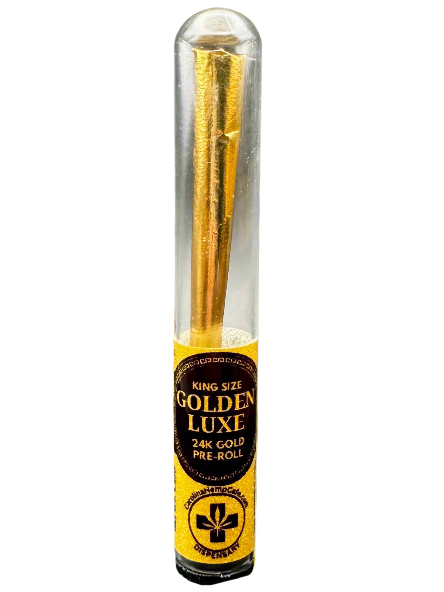 Gold pre-roll in a clear tube with a yellow label on a white background