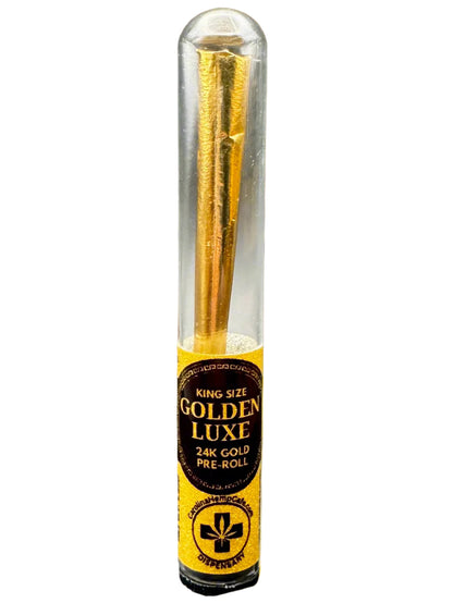 Gold pre-roll in a clear tube with a yellow label on a white background