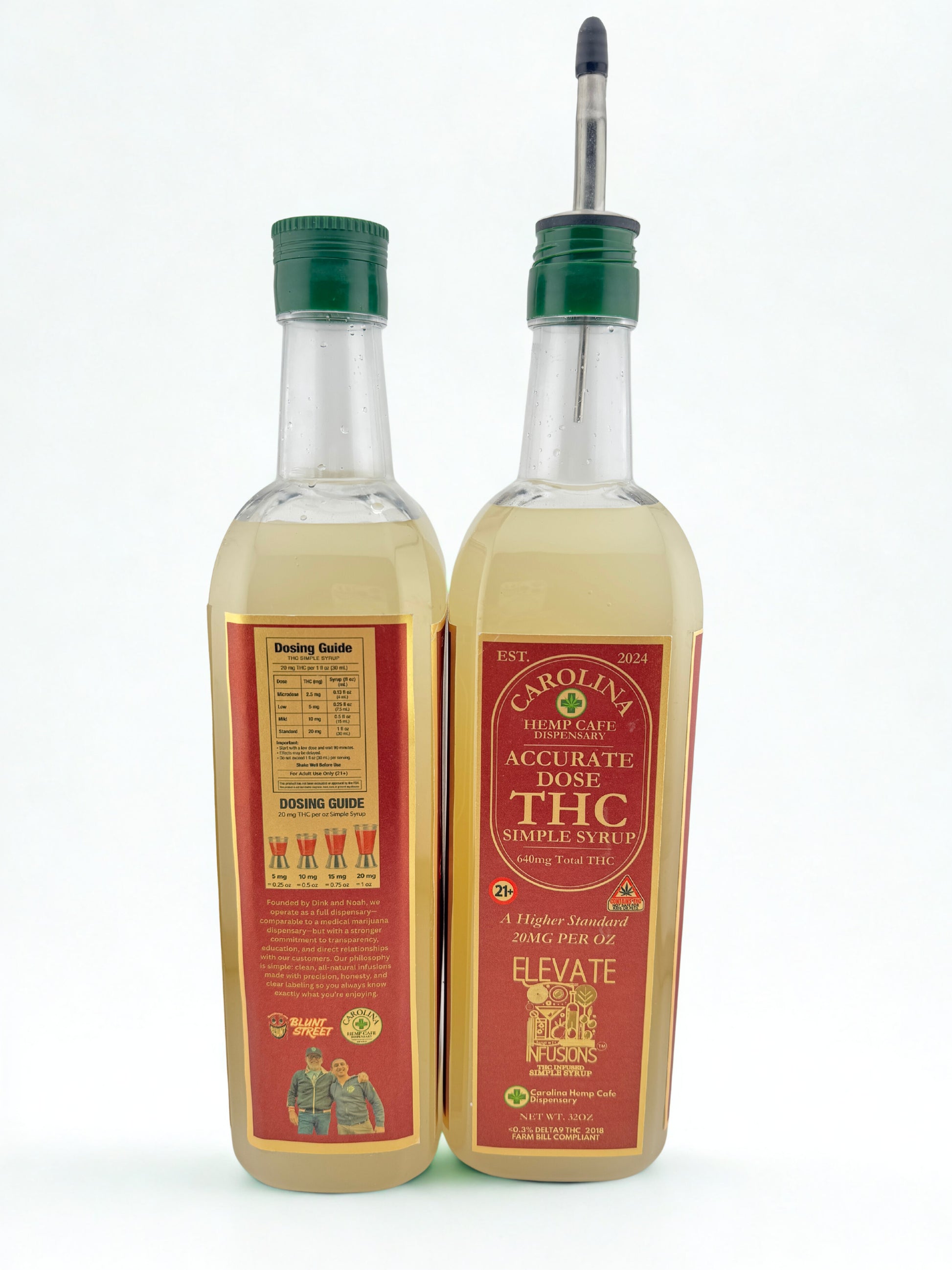 Two bottles of Carolina Heritage Spice Company spice oil with green caps on a white background