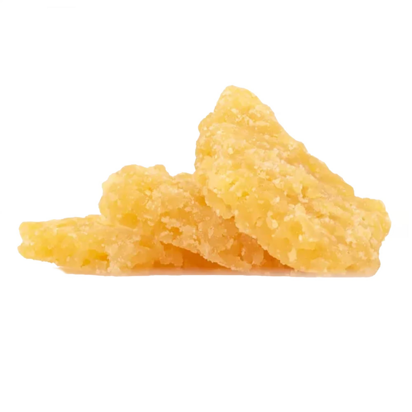 Three triangular pieces of golden-yellow, translucent, and granular gummy candy or resin pieces stacked on a plain white background.